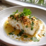 Slow Cooked Chilean Sea Bass With Coconut Lime Drizzle And Honey Dijon Glaze 5 Slow Cooked Chilean Sea Bass With Coconut Lime Drizzle And Honey Dijon Glaze 1767821863.5536385