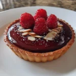 Velvet Raspberry Chocolate Tart With Chili Spiced Ganache 1772132418.6034517
